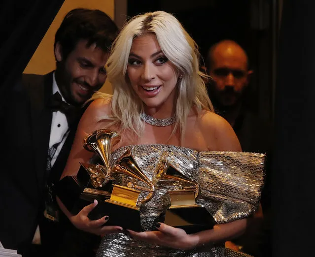 Lady Gaga poses backstage with her awards for Best Song Written for Visual Media and Best Pop Duo/Group Performance for “Shallow” and her Best Pop Solo Performance for “Joanne (Where do You Think You're Goin?)”' during the 61st Annual GRAMMY Awards at the Staples Center on February 10, 2019 in Los Angeles, California. (Photo by Mario Anzuoni/Reuters)