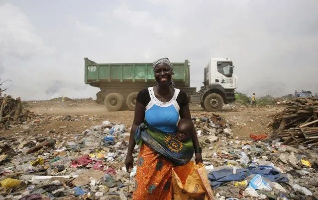 Kalandjibo Balo, a 23-year-old woman who recycles plastic for a living, poses for a photograph at Akouedo dump in Abidjan, Ivory Coast February 25, 2016.. (Photo by Thierry Gouegnon/Reuters)