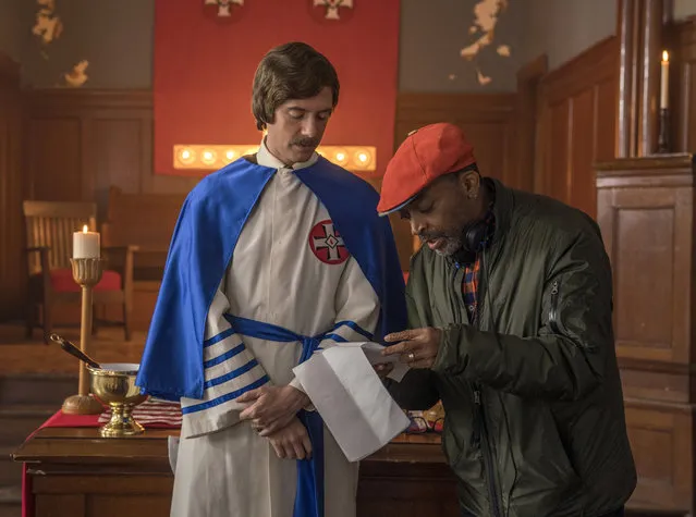 This image released by Focus features shows  Topher Grace, left, with director Spike Lee on the set of “BlacKkKlansma”. Lee was nominated for an Oscar award for best director for his film, “BlacKkKlansman”. The film was also nominated for best picture. (Photo by David Lee/Focus Features via AP Photo)