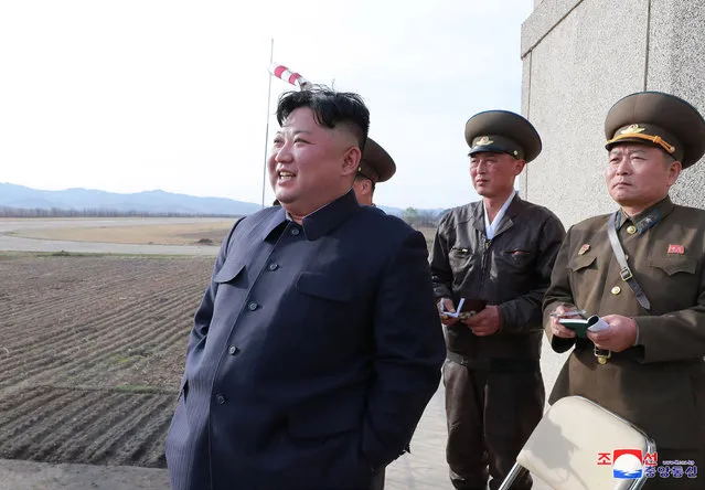 In this Tuesday, April 16, 2019, photo provided by the North Korean government, North Korean leader Kim Jong Un inspects fighter combat readiness of Unit 1017 of the Air and Anti-aircraft Force of the Korean People's Army, in an unknown location in North Korea. Kim is cautiously turning up the heat after his unsuccessful summit with U.S. President Trump in Hanoi two months ago. Returning to military optics for the first time in five months, Kim paid a surprise visit to the Air Force base and followed that up the next day by supervising the test of what the North’s official media described ominously – but ambiguously, and without any photos or video – as a new type of “tactical guided weapon”. Independent journalists were not given access to cover the event depicted in this image distributed by the North Korean government. The content of this image is as provided and cannot be independently verified. Korean language watermark on image as provided by source reads: “KCNA” which is the abbreviation for Korean Central News Agency. (Photo by Korean Central News Agency/Korea News Service via AP Photo)