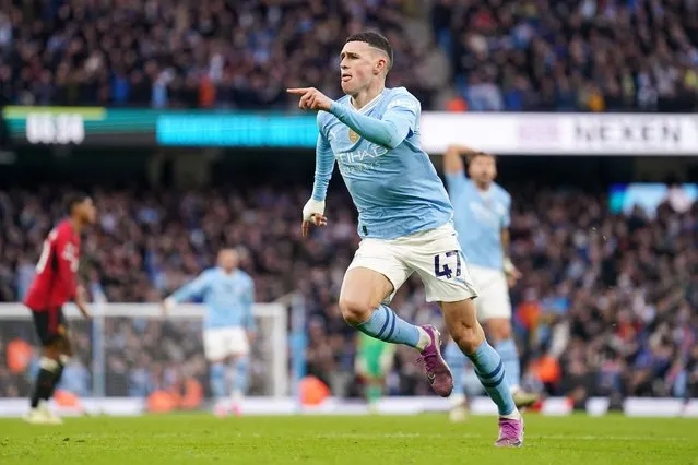Manchester City's Phil Foden celebrates scoring their side's first goal of the game during the Premier League match at the Etihad Stadium, Manchester on Sunday, March 3, 2024. (Photo by Mike Egerton/PA Images via Getty Images)