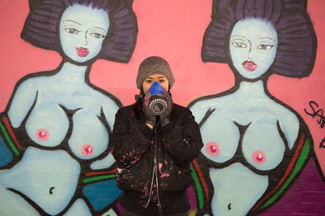 Two naked ladies painted by Saki & b*tches. (Photo by Dez Mighty/Susan Mackey)