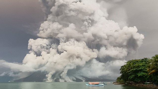 An eruption from Mount Ruang volcano is seen from Tagulandang island in Sitaro, North Sulawesi, on April 30, 2024. (Photo by AFP Photo/Stringer)