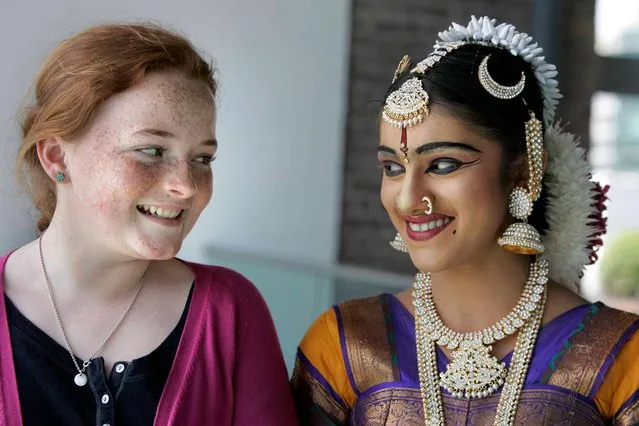 Emer Galvin Garry (12) and traditional dancer Saptha Raman Namboothiri (13) are pictured at the CHQ, Dublin, to raise funds for Global Schoolroom and to launch their 2014 volunteer programme, on April 30, 2014. The Global Schoolroom programme seeks to promote the sharing of educational experience between communities worldwide to help eradicate poverty, promote economic development and build sustainable communities. (Photo by Mark Stedman/Photocall Ireland)