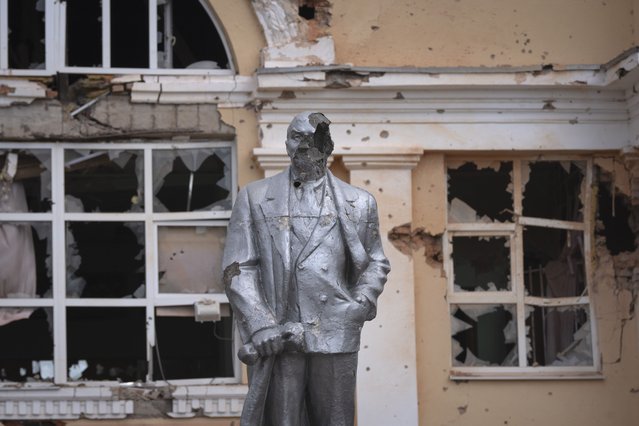 A damaged monument to Soviet founder Vladimir Lenin stands in a central square in Sudzha, Kursk region, Russia, Friday, August 16, 2024. This image was approved by the Ukrainian Defense Ministry before publication. (AP Photo/Stringer)