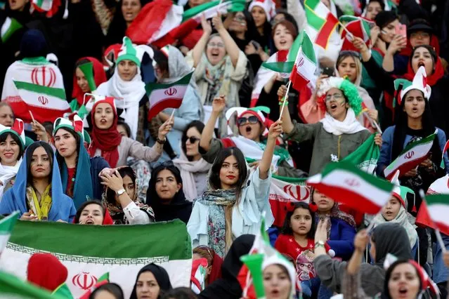 Iranian women attend Iran's World Cup Asian qualifier against Cambodia at the Azadi stadium in Tehran, Iran on October 10, 2019. The game was as notable for the presence of 3,500 female fans, who were allowed into the stadium for a World Cup qualifier for the first time in the four decades since the Islamic Revolution. (Photo by WANA via Reuters)
