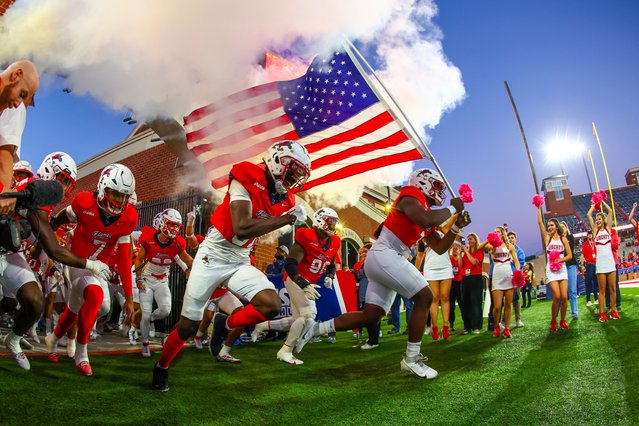 The Liberty Flames take the field before a football game against the Florida International University Panthers at Williams Stadium on October 08, 2024 in Lynchburg, Virginia. (Photo by David Jensen/Getty Images)