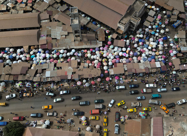 A drone view shows Bakoteh market in Serekunda, on the outskirts of Banjul, Gambia, on June 7, 2024. (Photo by Zohra Bensemra/Reuters)