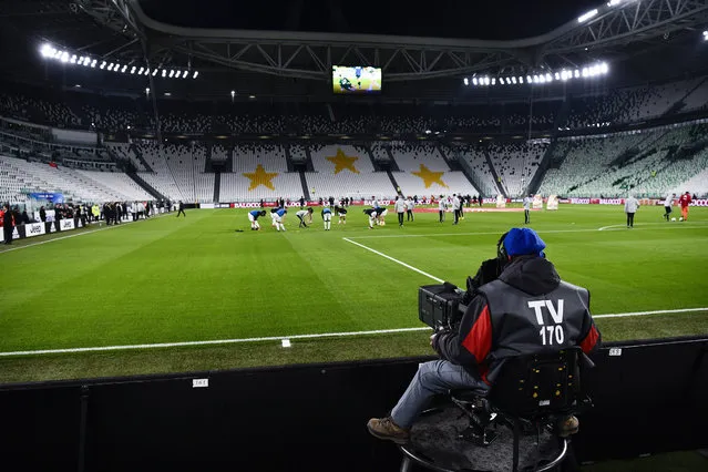 A view of the empty Juventus stadium, as a measure against coronavirus contagion, prior to the Serie A soccer match between Juventus and Inter, in Turin, Italy, Sunday, March 8, 2020. Serie A played on Sunday despite calls from Italy’s sports minister and players’ association president to suspend the games in Italy’s top soccer division. (Photo by Marco Alpozzi/LaPresse via AP Photo)