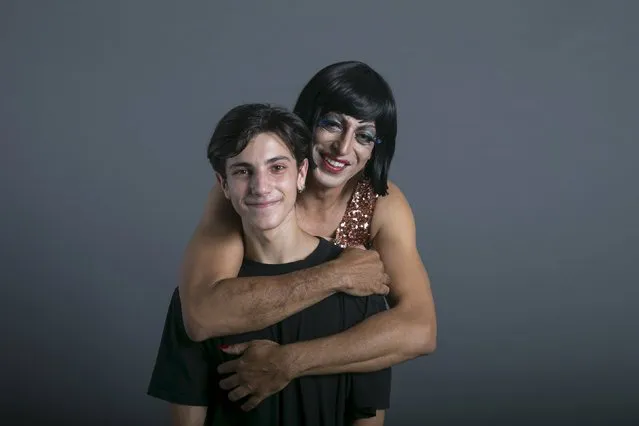 Drag queen Yaron Gil Shuster, who goes by the stage name Hilba Bat Saluf, and his son Noam (front) pose for a photo in a studio in Tel Aviv August 22, 2015. (Photo by Baz Ratner/Reuters)