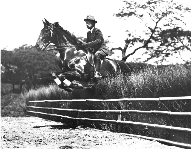 Emperor Hirohito, 26, is shown in steeplechase on his horse during his equestrian practice in Tokyo, Japan on June 10, 1927. (Photo by AP Photo)