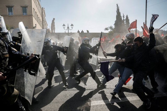 Greek university students clash with riot police amid tear gas,during a demonstration against a planned bill which opens the way for the operation of private universities, in Athens, Greece, on February 1, 2024. (Photo by Louisa Gouliamaki/Reuters)