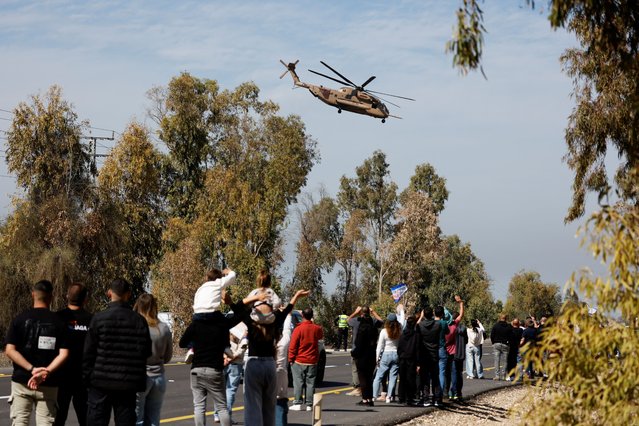 A helicopter transports released hostages after taking off from Reim base, as part of hostages-prisoners swap deal and a ceasefire deal in Gaza between Hamas and Israel, in Reim, Israel on February 15, 2025. (Photo by Amir Cohen/Reuters)
