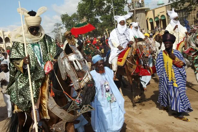 The Emir of Zazzau Shehu Idris rides on a horse carriage during the Durbar festival parade in Zaria, Nigeria September 14, 2016. (Photo by Afolabi Sotunde/Reuters)