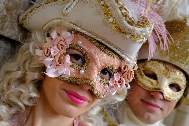 Masked revellers pose during the Carnival in Venice, Italy January 28, 2018. (Photo by Manuel Silvestri/Reuters)