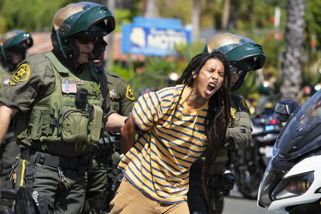 Several people were arrested in San Clemente, California, U.S. on Thursday, September 20, 2020 as dozens of protesters gathered to demonstrate the fatal shooting of a homeless man by Orange County Sheriff's deputies the day before. (Photo by Katrina Kochneva/ZUMA Wire/Rex Features/Shutterstock)