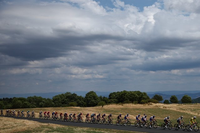 UAE Team Emirates – XRG team's Slovenian rider Tadej Pogacar wearing the overall leader's yellow jersey cycles ahead of the pack of riders (peloton) in the ascent of the Cote de Berzet during the 10th stage of the 112th edition of the Tour de France cycling race, 165.3 km between Ennezat and Le Mont-Dore Puy de Sancy, in central France, on July 14, 2025. (Photo by USA Today)