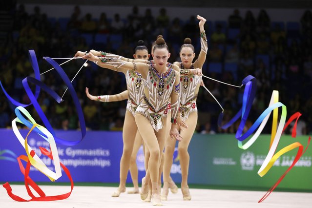Turkey's team competes with ribbons during the group all-around final at the 41st FIG Rhythmic Gymnastics World Championships at Carioca Arena, in Rio de Janeiro, Saturday, August 23, 2025. (Photo by Bruna Prado/AP Photo)