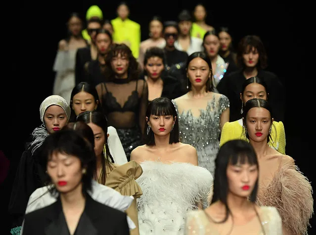 Models walks the runway during the YOUG X collection show by Chinese designer Xing Yong on day three of China Fashion Week at 751D.PARK on October 26, 2020 in Beijing, China. (Photo by Zhe Ji/Getty Images)