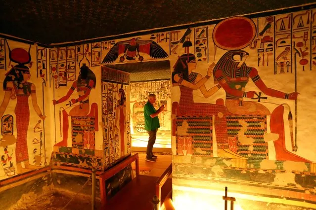 A tourist visits the tomb of Nefertari at the Valley of the Queens in Luxor, Egypt, on January 24, 2023. Nefertari is the wife of famous ancient Egypt's Pharaoh Ramesses II. Built over 3,000 years ago, the tomb is famous for its mural paintings with vivid colors. It was discovered in 1904, and reopened to tourists in 2016 after years of restoration. (Photo by Sui Xiankai/Xinhua News Agency)