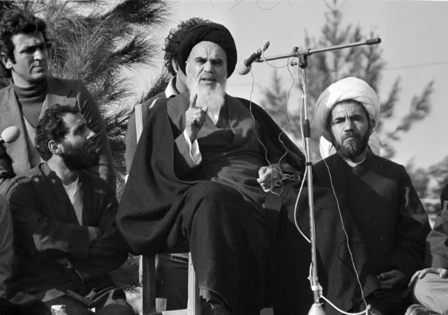 In this February 1 , 1979 file photo, the Ayatollah Khomeini speaks to followers at Behesht Zahra Cemetery after his arrival in Tehran, Iran, ending 14 years of exile. (Photo by AP Photo)