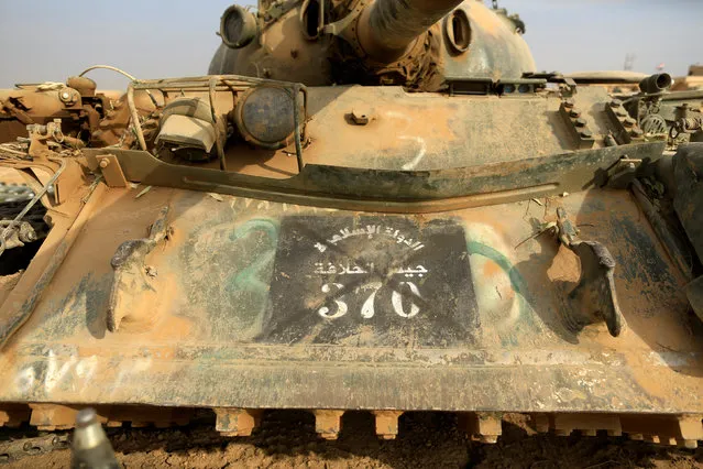 A captured Islamic State tank is seen at the Iraqi army base in Qaraqosh east of  Mosul, Iraq November 8, 2016. (Photo by Zohra Bensemra/Reuters)