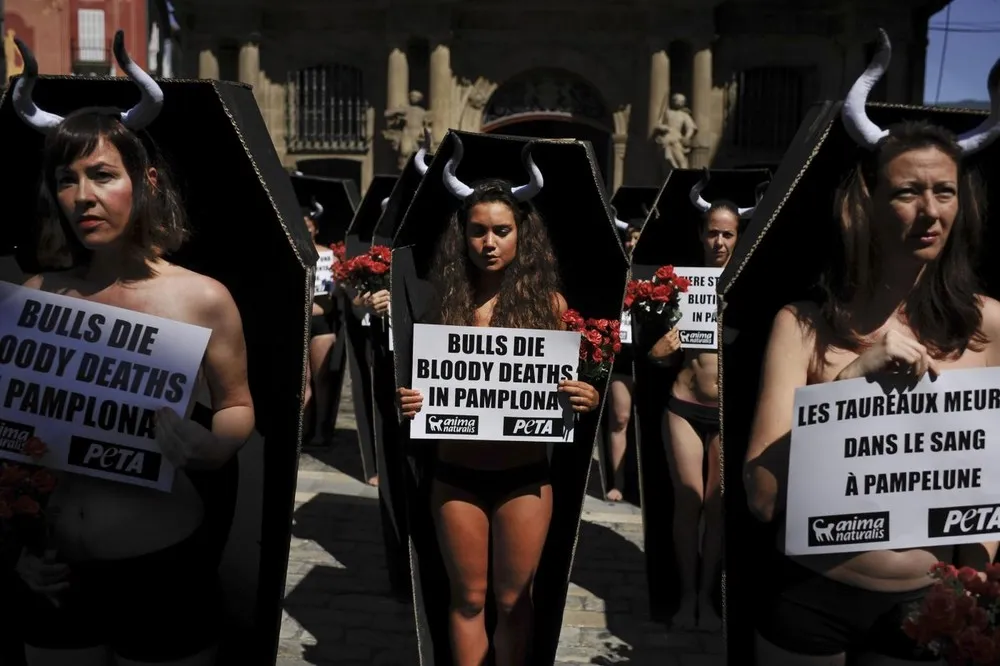 Naked “Corpses” Bare the Bloody Cruelty of Bullfighting in Pamplona
