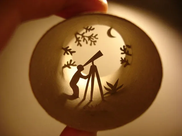 Toilet paper roll art of a man looking through a telescope. (Photo by Anastassia Elias/Caters News)