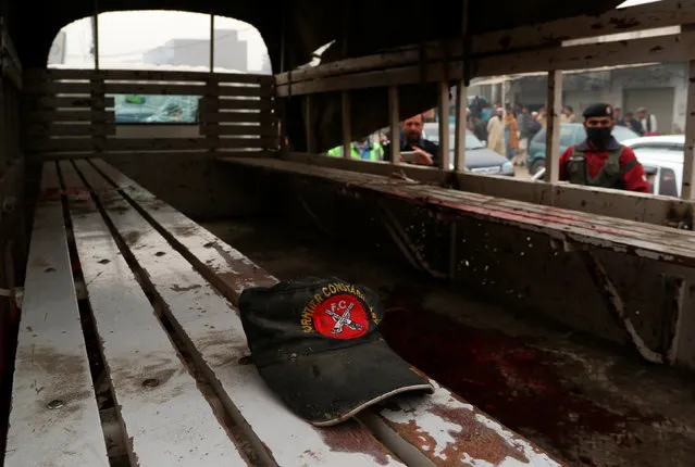 A hat remains on a bench after a blast killed three officers of the Frontier Constabulary in Peshawar, Pakistan November 22, 2016. (Photo by Khuram Parvez/Reuters)