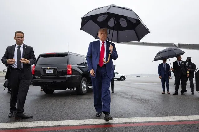 Former president Donald Trump arrives at Ronald Reagan Washington National Airport in Arlington, Va. on Thursday, August 3, 2023 after appearing at E. Barrett Prettyman United States Court House. Trump pleaded not guilty Thursday to charges that he conspired to overturn the results of the 2020 election. (Photo by Tom Brenner for The Washington Post)