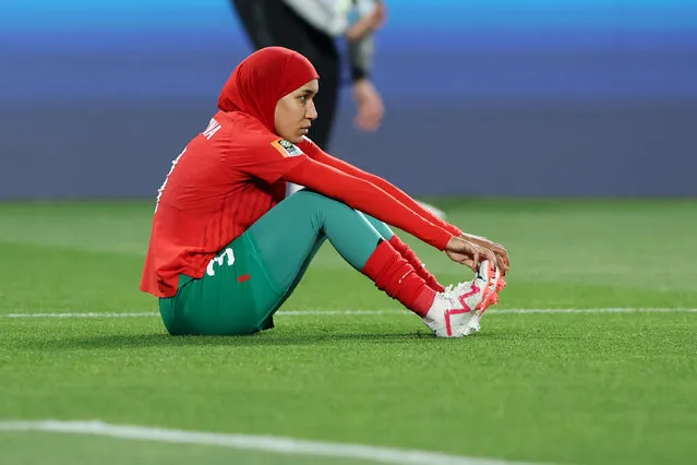 Nouhaila Benzina of Morocco shows dejection after the team’s 0-4 defeat and elimination from the tournament following during the FIFA Women's World Cup Australia & New Zealand 2023 Round of 16 match between France and Morocco at Hindmarsh Stadium on August 08, 2023 in Adelaide, Australia. (Photo by Sarah Reed/Getty Images)