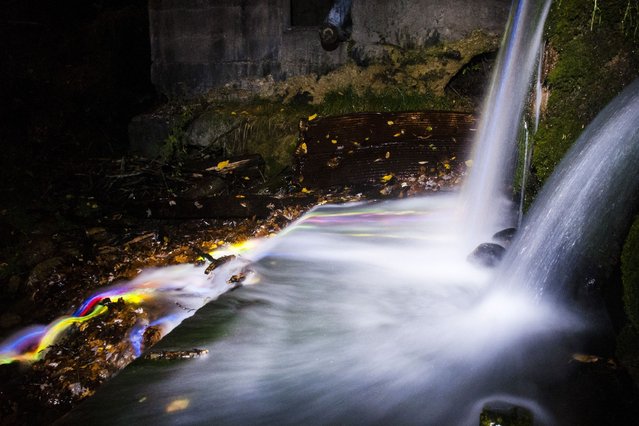 “Neon Luminance” glowstick waterfall photography, California, America. (Photo by Sean Lenz/Kristoffer Abildgaard)