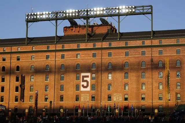 The retired number of Baltimore Orioles Hall of Fame third baseman Brooks Robinson is seen on the wall of the warehouse at Oriole Park at Camden Yards prior to a baseball game between the Orioles and the Washington Nationals, Wednesday, September 27, 2023, in Baltimore. Robinson died on Tuesday at the age of 86. (Photo by Julio Cortez/AP Photo)