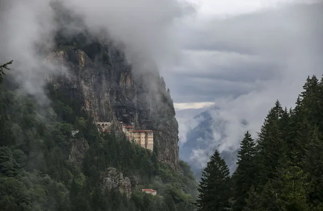 A view of the Sumela monastery, where Ecumenical Patriarch Bartholomew I, the spiritual leader of the world's Orthodox Christians, held a Divine Liturgy to mark the “Dormition of the Mother of God”, in Trabzon, Turkey, Sunday, August 15, 2021. (Photo by Emrah Gurel/AP Photo)