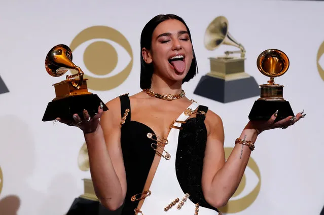 Dua Lipa poses backstage with her awards for Best Dance Recording for “Electricity” and for Best New Artist during the 61st Annual GRAMMY Awards at the Staples Center on February 10, 2019 in Los Angeles, California. (Photo by Mario Anzuoni/Reuters)