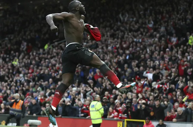 Manchester United's Romelu Lukaku celebrates scoring his side's third goal of the game,  during the English Premier League soccer match between Manchester United and Southampton at Old Trafford, in Manchester, England, Saturday, March 2, 2019. (Photo by Martin Rickett/PA Wire via AP Photo)