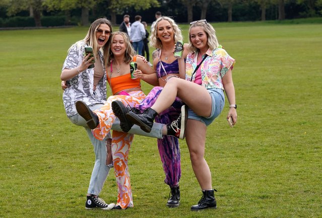 Revellers arriving for a music festival in Sefton Park in Liverpool, United Kingdom on Sunday May 2, 2021, as part of the national Events Research Programme (ERP). (Photo by Danny Lawson/PA Images via Getty Images)