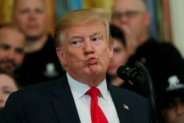 U.S. President Donald Trump reacts as he speaks at the Wounded Warrior Project Soldier Ride event after the release of Special Counsel Robert Mueller's report, in the East Room of the White House in Washington, U.S., April 18, 2019. (Photo by Carlos Barria/Reuters)