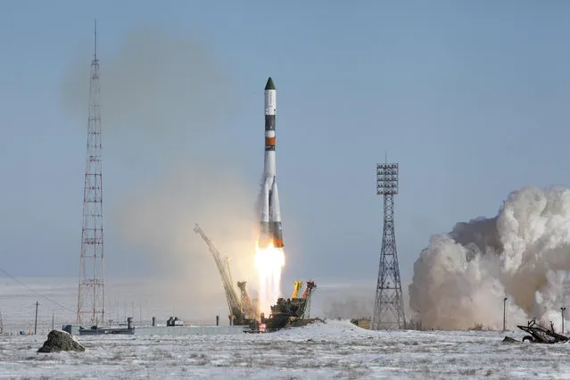 In this photo provided by the Russian Space Agency (Roscosmos) press service, a Soyuz-U booster rocket carrying the Progress MS-05 spacecraft blasts off from the Russian-leased Baikonur Cosmodrome in Kazakhstan Wednesday, February 22, 2017. The unmanned Russian cargo ship lifted off successfully Wednesday on a supply mission to the International Space Station. (Photo by Russian Space Agency Roscosmos press service via AP Photo)
