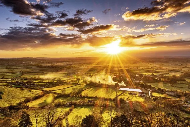 Sun bursts over Glastonbury, Somerset on December 2, 2021, in a welcome reprieve from days of cold and wet. Today will be mostly dry with sunny spells in the north, although rain will arrive int he northwest and southwest later. (Photo by Michelle Cowbourne/South West News Service)