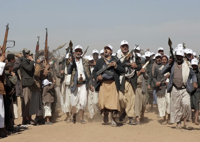 Houthi fighters march during a rally of support for the Palestinians in the Gaza Strip and against the U.S. strikes on Yemen outside Sanaa on Monday, January 22, 2024. (Photo by AP Photo)