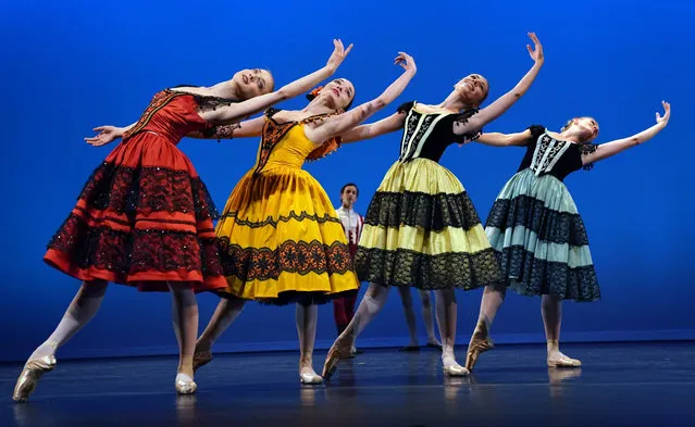 Dancers with the Royal Danish Ballet perform a scene from “The Bournonville Legacy” during a dress rehearsal before opening night at the Joyce Theater in New York on July 9, 2019. (Photo by Timothy A. Clary/AFP Photo)