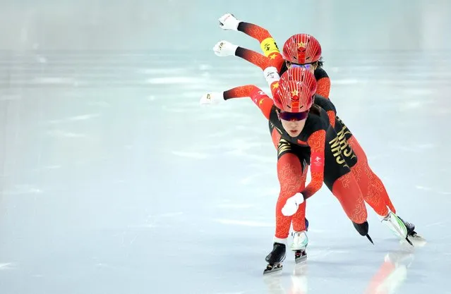 Han Mei, Adake Ahenaer and Li Qishi of Team China compete during the Women's Speed Skating Team Pursuit Quarterfinals on day eight of the Beijing 2022 Winter Olympic Games at National Speed Skating Oval on February 12, 2022 in Beijing, China. (Photo by Phil Noble/Reuters)