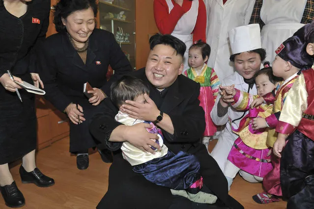 North Korean leader Kim Jong Un visits an orphanage in this undated photo released by North Korea's Korean Central News Agency (KCNA) in Pyongyang in February 4, 2014. (Photo by Reuters/KCNA)