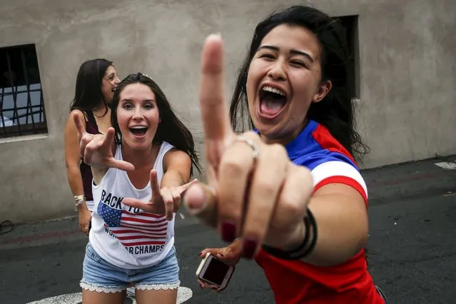U.S. fans celebrate USA's win in the Women's World Cup final soccer match against Japan, at the Underground Pub and Grill in Hermosa Beach, California July 5, 2015. The United States ushered in a new era of dominance with their Women's World Cup triumph over Japan on Sunday, a victory that will do plenty to bring an already passionate American interest in the sport to unprecedented levels. (Photo by Patrick T. Fallon/Reuters)