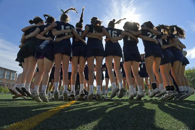 The Georgetown Visitation Cubs rally before the game against the St. Stephens & St. Agnes Saints May 16, 2016 in Bethesda, MD. The St. Stephens & St. Agnes Saints beat the Georgetown Visitiation Cubs 16-5 in the ISL lacrosse championship game at Stone Ridge.  (Photo by Katherine Frey/The Washington Post)