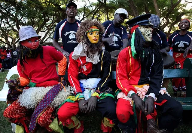 Members of the Landilani Amanyawa Nyau dance group wait to perform during Africa Day commemorations held in Harare on May 25, 2012