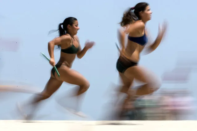 The National parks department hosts the 30th annual “All-Women Lifeguard Tournament” in Sandy Hook NJ. July 30, 2014. (Photo by Anthony Causi)