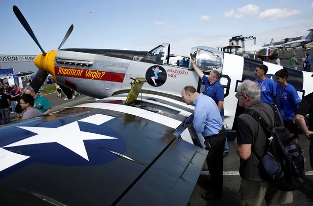 A North American P-51B Mustang airplane is among the historic aircraft displayed at an event marking the centennial of The Boeing Company in Seattle, Washington July 15, 2016. (Photo by Jason Redmond/Reuters)