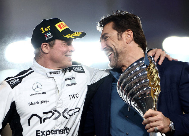Brad Pitt is seen during filming for an F1-inspired movie alongside actor Javier Bardem at the Abu Dhabi Grand Prix on December 8, 2024. (Photo by Amr Alfiky/Reuters)